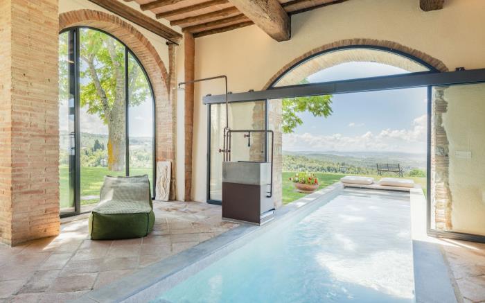 Indoor/outdoor pool overlooking vineyards