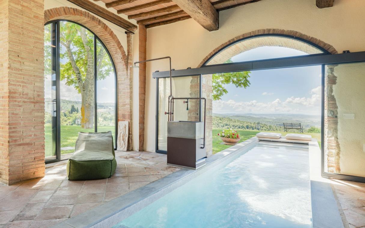 Indoor/outdoor pool overlooking vineyards