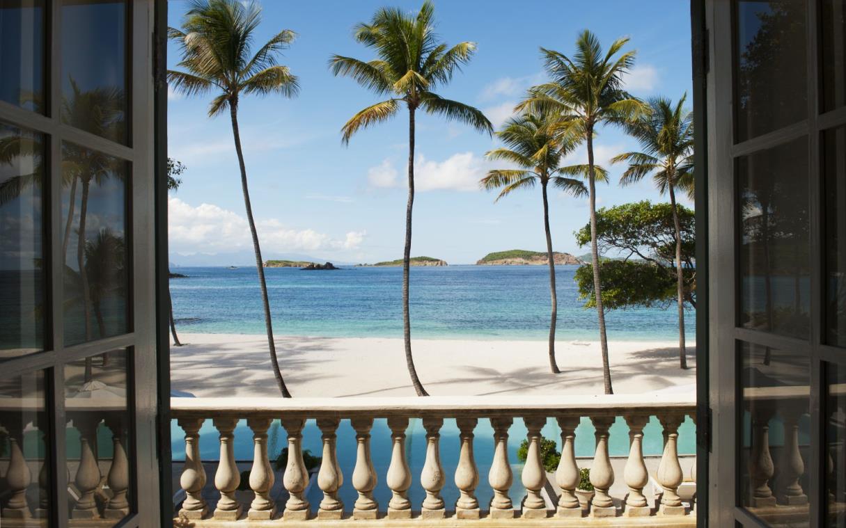 villa-mustique-grenadine-carribbean-luxury-pool-palm-beach-view.jpg