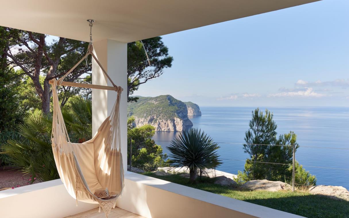 villa-ibiza-balearic-spain-luxury-pool-views-modern-bright-blue-cliff-house-vie (3).jpg
