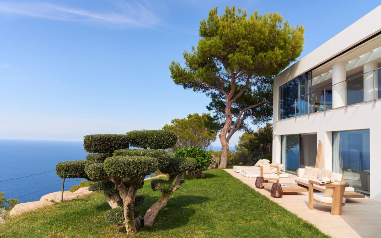 villa-ibiza-balearic-spain-luxury-pool-views-modern-bright-blue-cliff-house-ext (2).jpg