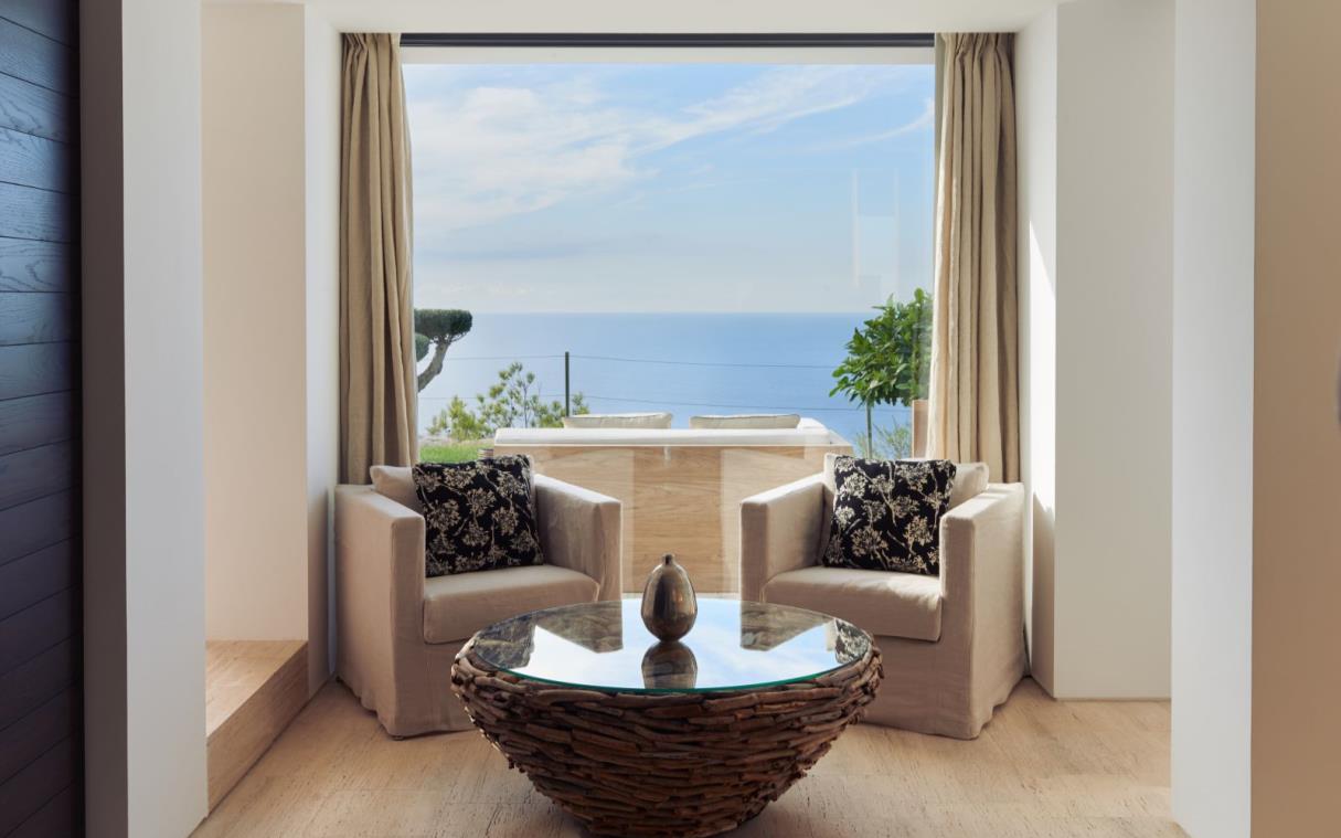 villa-ibiza-balearic-spain-luxury-pool-views-modern-bright-blue-cliff-house-bed (7).jpg